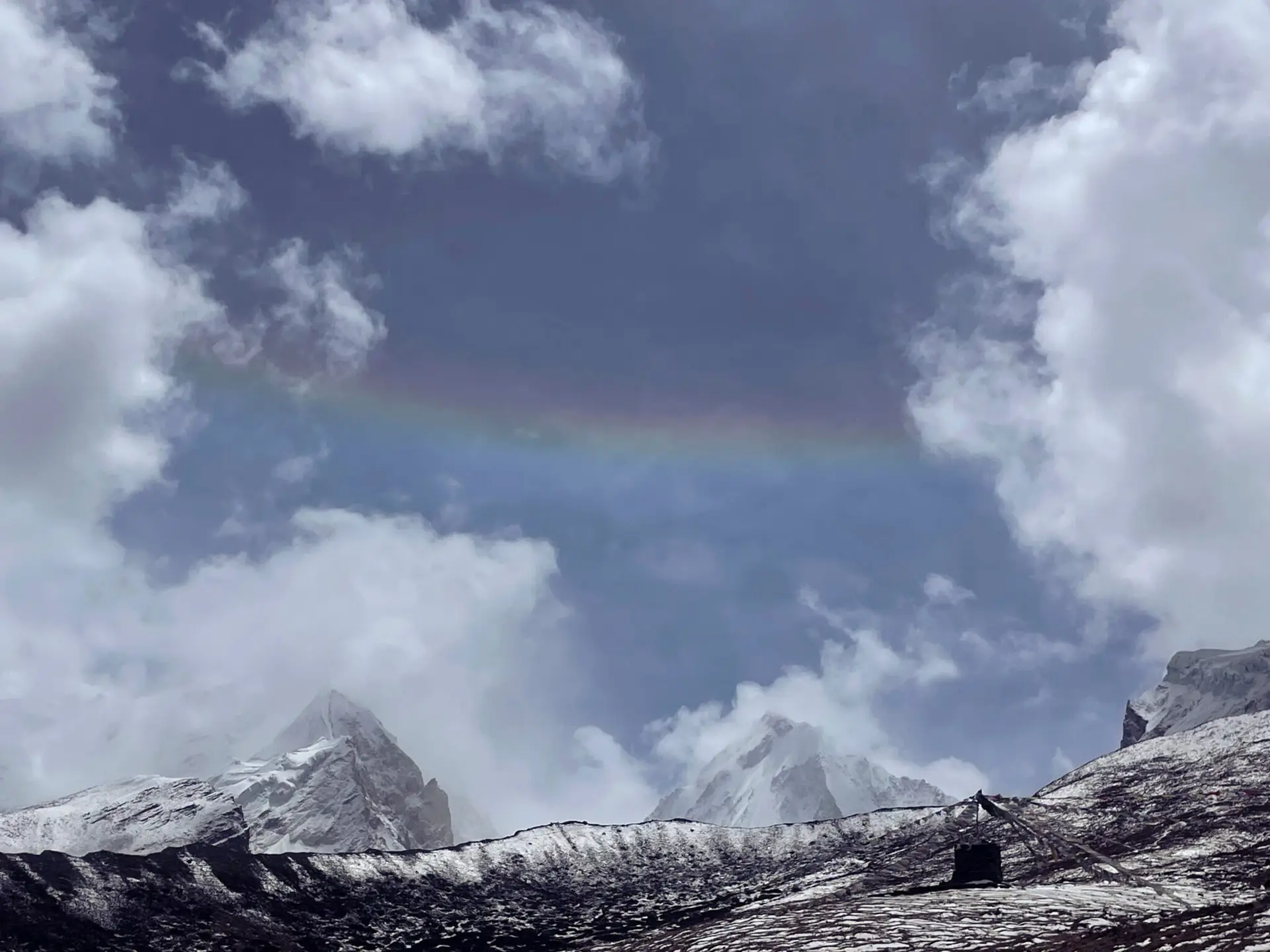 Rainbow on top of a snowy mountain-Nar Phu Trek