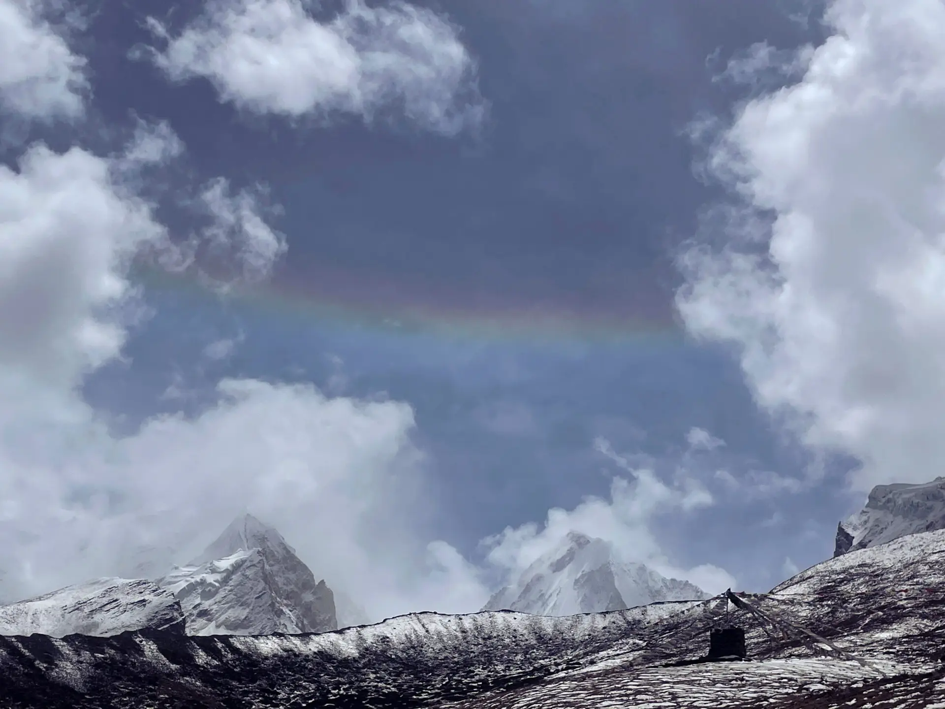 Rainbow on top of a snowy mountain-Nar Phu Trek